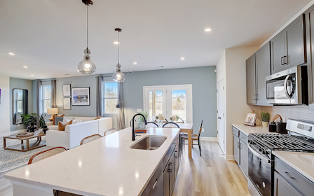 A kitchen with a large island.