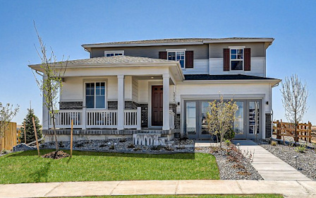 A house with a large front yard.