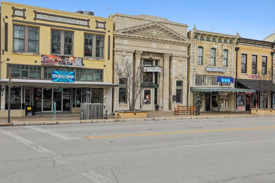 A street with buildings along it.