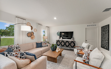 A living room with a fireplace.