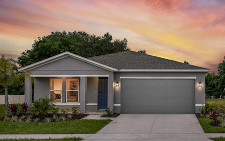 A house with a garage and a driveway.