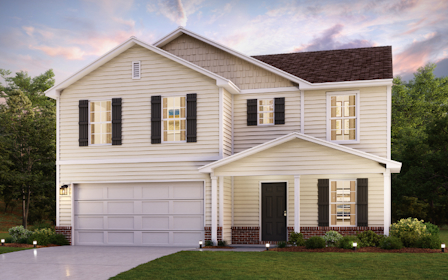 A white house with a lawn.