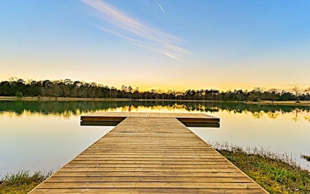 A wooden dock over a body of water.