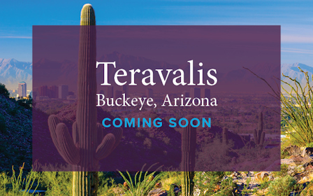 A sign with a city in the background.