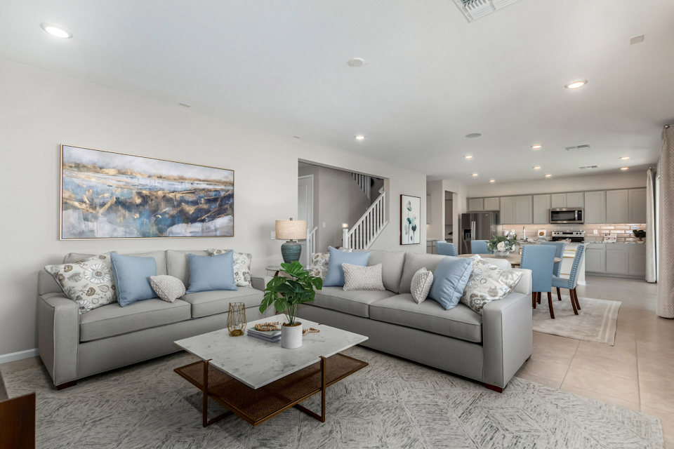 A living room with a couch and a coffee table.