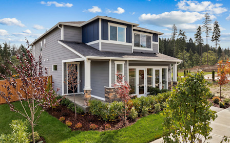 A house with a large front yard.