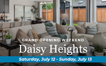 A room with a couch and a table with plants.